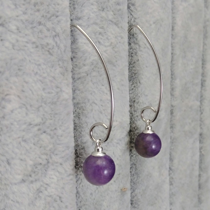 Decorative earrings made of purple amethyst on an open earwire KKW08