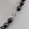 A set of real pearls of black rice and earrings on a decorative stick KP12